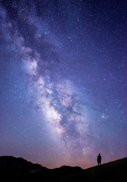 Man looking at Milky Way